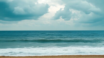 Serene Ocean Scene Under Cloudy Skies