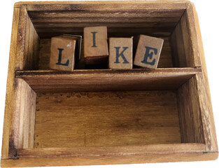 wooden box with alphabet "LIKE"