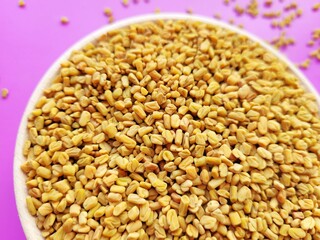 Raw pile of fenugreek seeds.