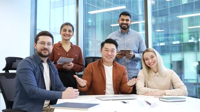 Confident happy business man invites you to join the team in office. Employee, hr entrepreneur, manager calls to invest or hiring. Join Us. Leaders staff group corporate people look at camera smiling