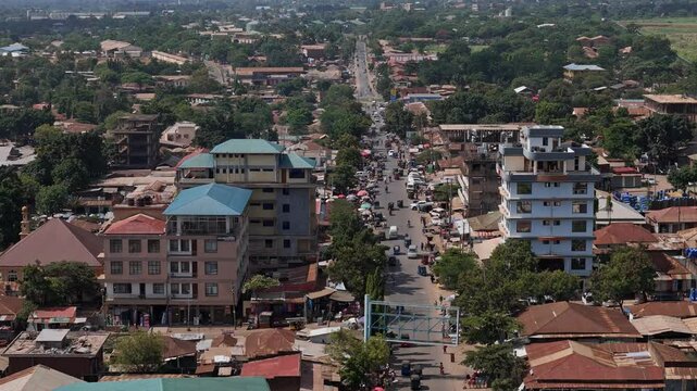 Aerial shot of Moshi city streets with markets and buildings