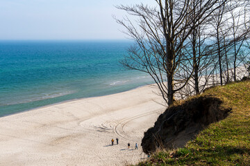 Scenic View of a Sandy Beach and Blue Sea from a Cliffside Overlook in Jastrzębia Góra