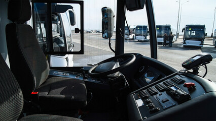 View professional driver's cab in the modern bus.