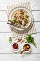 beef and rice in white bowl, top view