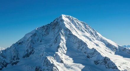 Naklejka premium Snowy Mountain Peak Against Blue Sky for Adventure and Exploration
