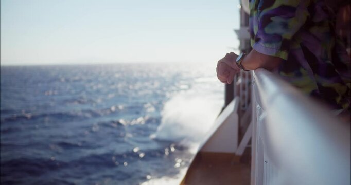 
Passenger Enjoying The Sight Aboard A Cruise Ship In The Summer