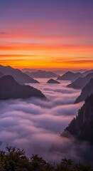Serene mountain landscape at sunrise with sea of clouds and vibrant sky