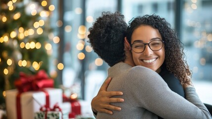Couple embracing joyfully near Christmas tree