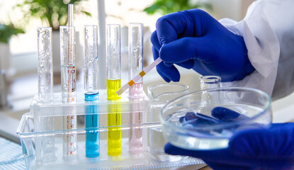 Tap water samples for analysis. Selective focus.