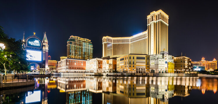Macau- September 25, 2019: Beautiful night view of Venetian buildings in Cotai, Macau, with beautiful reflections of the majestic buildings in the water, owned by the American Las Vegas Sands company.
