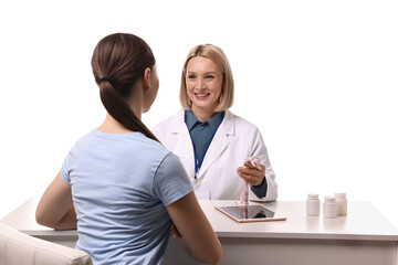 Weight loss. Smiling nutritionist consulting patient at table against white background