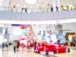 A festive Christmas atmosphere shines through an abstract bokeh light display.