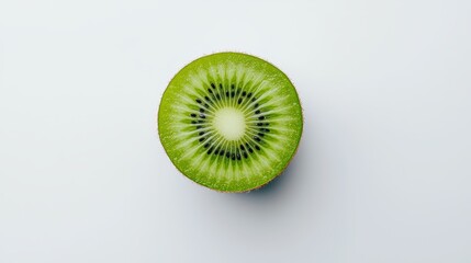 Fresh sliced kiwi fruit on white background with closeup view of juicy green tropical slices