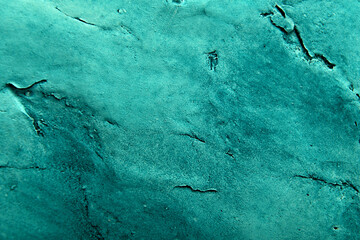 
plaster art background in bright dark green color