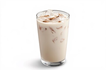Refreshing horchata beverage with ice cubes and cinnamon in a glass on white background