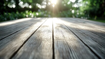 Empty wooden table in sunny park for product placement