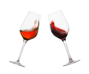 Glasses of splashing red wine isolated on white