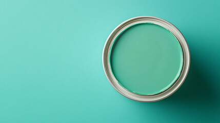 A Top view photograph of a Green paint can. 