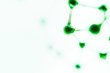 Delicate green molecules intertwine in soft, ethereal background