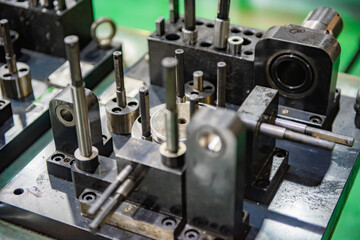 Factory automation production line. Automotive parts production line. Workers are producing car brake discs and various components in the machining workshop. Inside the automotive intelligent factory