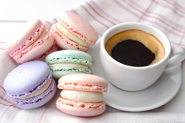  pastel macarons with coffee