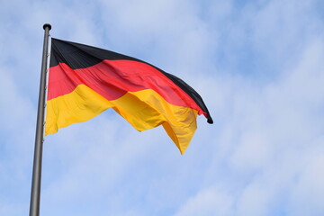 The German Unity Flag is a national memorial to German reunification that was raised on 3 October 1990. It flies in front of the Reichstag building in Berlin (seat of the German parliament).