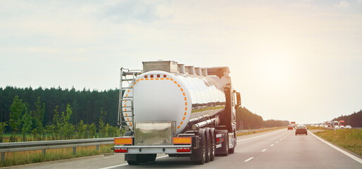Hazardous waste transport truck driving on road