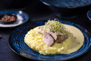 Pork tenderloin with mushroom sauce and mashed potatoes