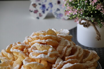 edible brushwood dessert with powdered sugar