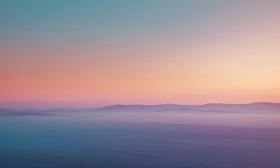 A serene landscape at dawn, featuring soft pastel hues of pink and purple over rolling hills and misty valleys.