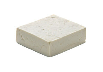 Isolated block of fresh tofu on a transparent background studio shot