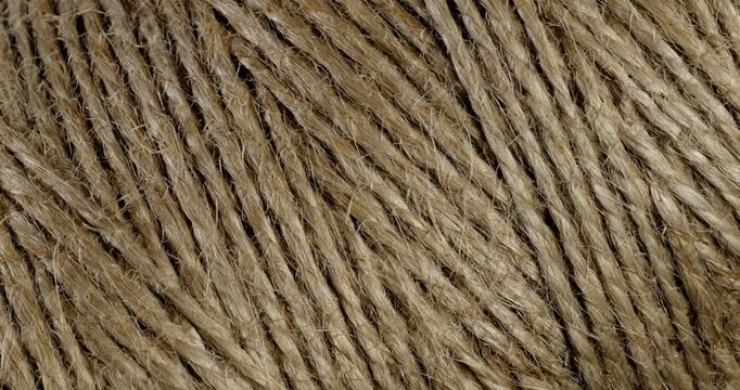 Texture of Natural Jute Twine. High-resolution texture of natural jute twine, showcasing its rough fibers and organic weave.	
