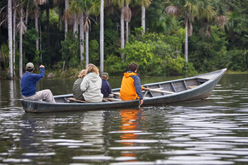 Lake Sandoval is a beautiful oxbow lake located in the Tambopata National Reserve in the Madre de...