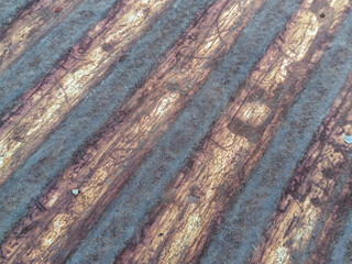 Abstract Corrugated Metal Sheet Background With Rusty Texture And Gray Hues