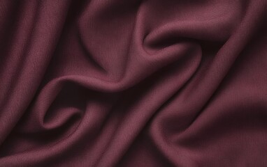 Obraz premium Deep burgundy textured fabric with elegant soft drapes and smooth satin finish creating a rich and stylish high end background for luxury interior and fashion