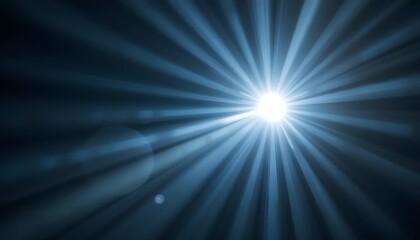 Obraz premium Radiant Light Burst: Abstract Blue Light Rays Emanating from a Central Glow, Creating a Dramatic and Spiritual Atmosphere.