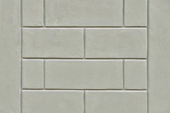 Elegant architectural grey texture with a rusticated effect, typical of historic Italian facades