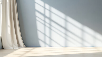 Fototapeta premium Sunlight streams through a flowing curtain creating captivating patterns on a gray blue wall in a serene indoor space