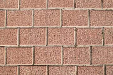 Foto de losa de cemento color terracota, simulando ladrillo para usar como fondo de escritorio.