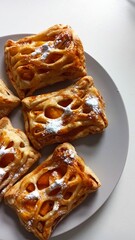 Golden puff pastries with fruit filling