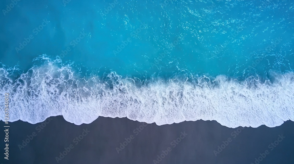 Poster aerial view of gentle ocean waves crashing on serene beach with sparkling blue water and white foam 