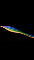 Swirling vibrant rainbow colors wave against stark black backdrop, radiating energy and hope.