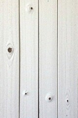 White wooden board with visible knots and imperfections, woodworking, textured wood, white wooden board