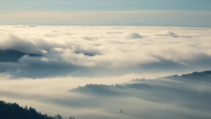 Dense fog rolling over a misty mountain landscape, landscapes, atmospheric effects