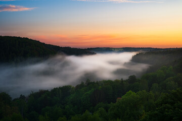 Sunrise Over the Foggy Valley