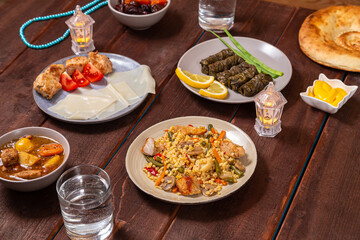 Set table Ramadan iftar Eid al fitr prayer beads, dolma, khinkal, bulgur