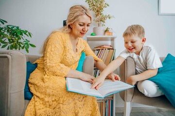 woman engaging in reading activity with child in cozy indoor setting concept of early childhood...