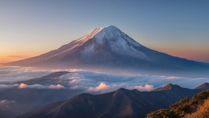 Fototapeta premium Majestic Sunrise Over Snow-Capped Mountain Peak Surrounded by Rolling Clouds and Mountain Ranges with Warm Morning Light