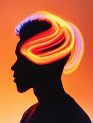 Silhouette of man with neon light trail vibrant background
