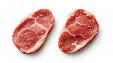 Two raw pork chops, ready for cooking. Rich red color against a bright white background.